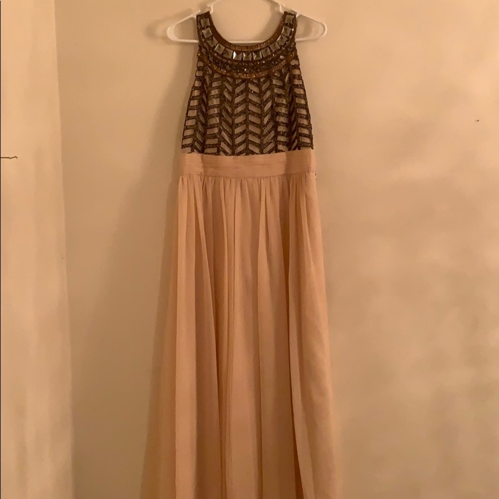Light pink dress with high collared beading